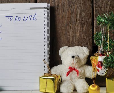 To do list placed next to christmas decorations